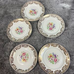 Stetson five 22k gold floral saucer plates